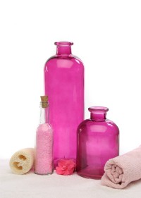 spa wellness rose flessen met handdoek